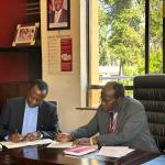 AACC GS and SPU VC signing the MoU